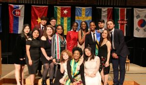 International students pose at banquet